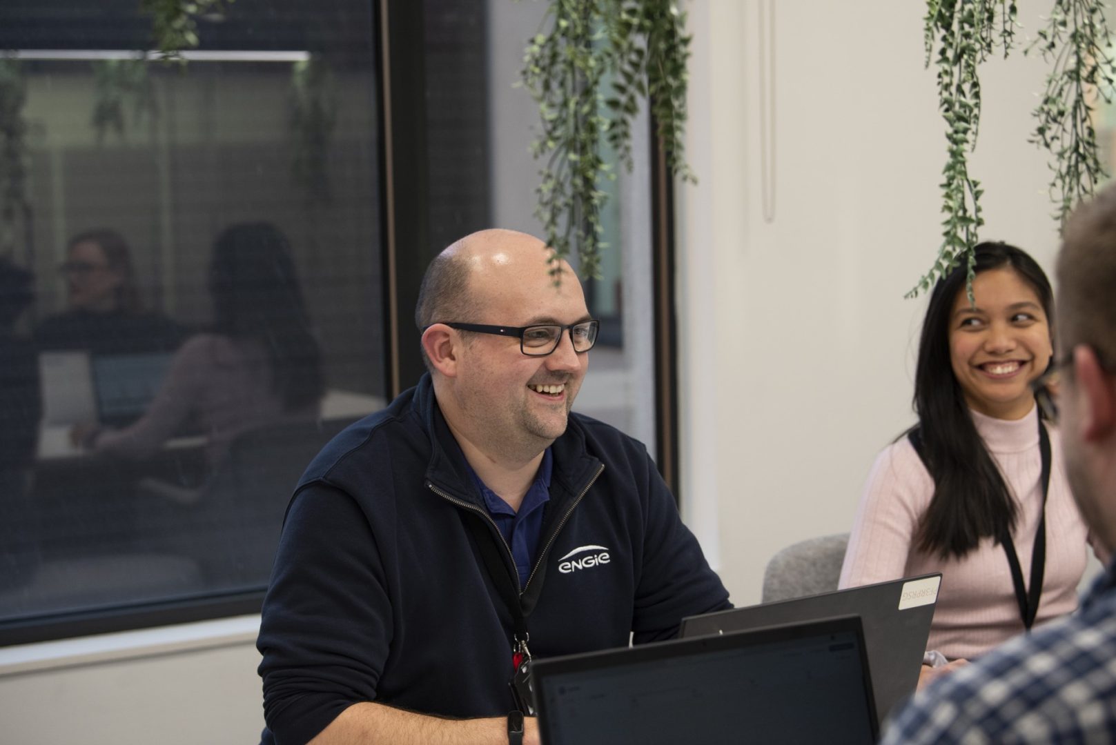 Engie team collaborating in office during meeting