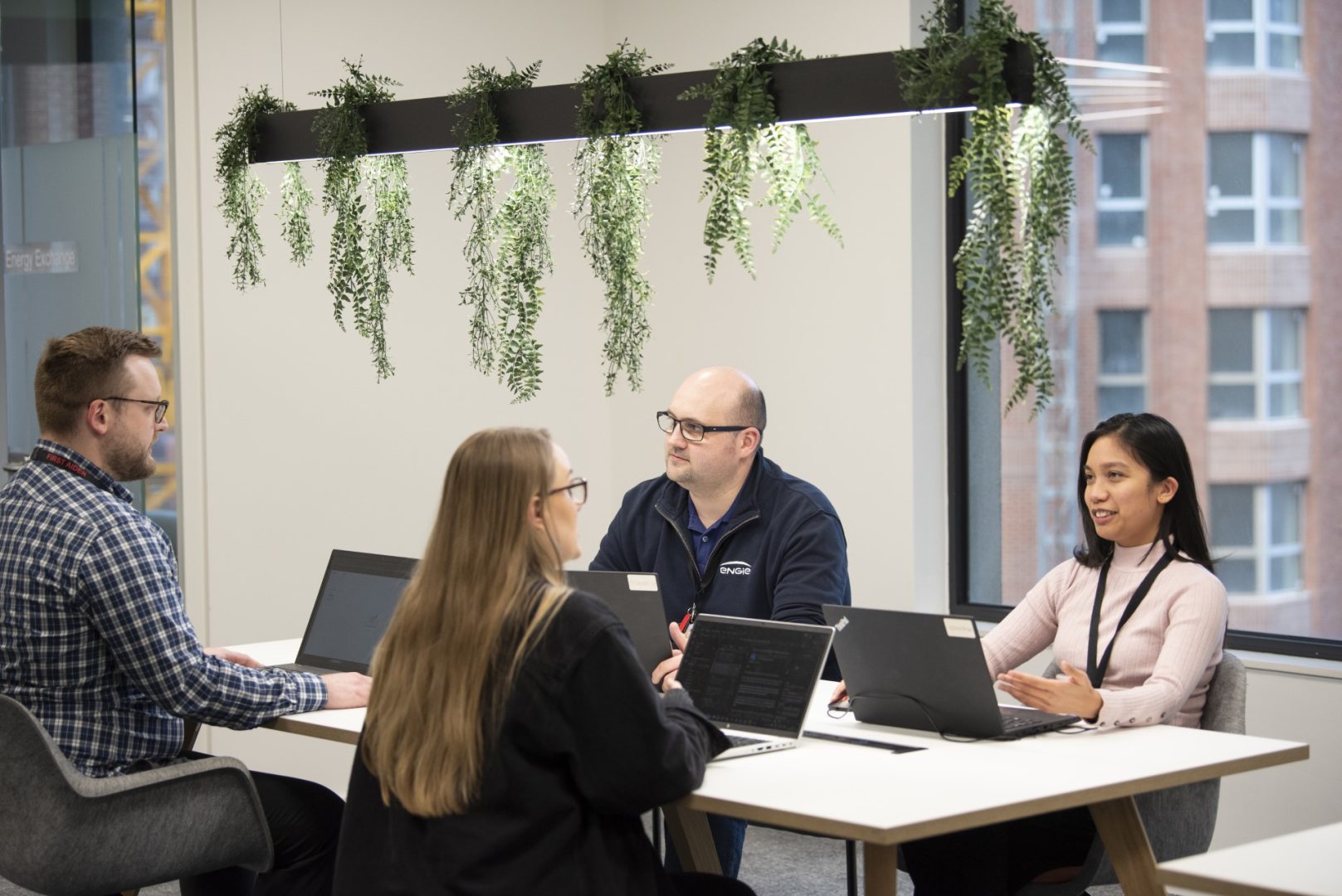 Engie team collaborating in office during meeting