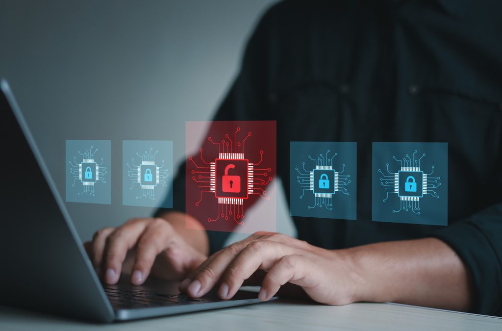 Cyber ​​security risk and data breach concept. Businessman using laptop with digital key icon. Red key open symbol of data breach. Cyber ​​security.