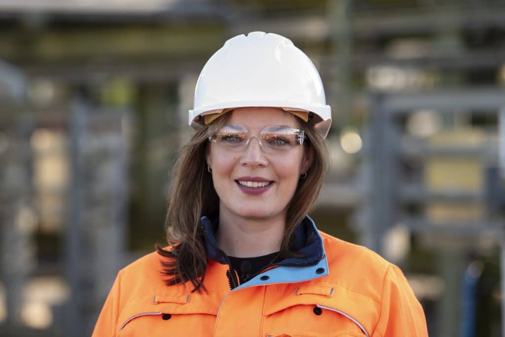 Operations manager stood infront of gas storage site