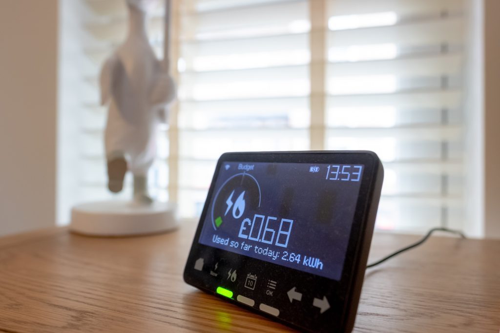 Shallow focus of a digital smart meter showing the amount of used electricity.