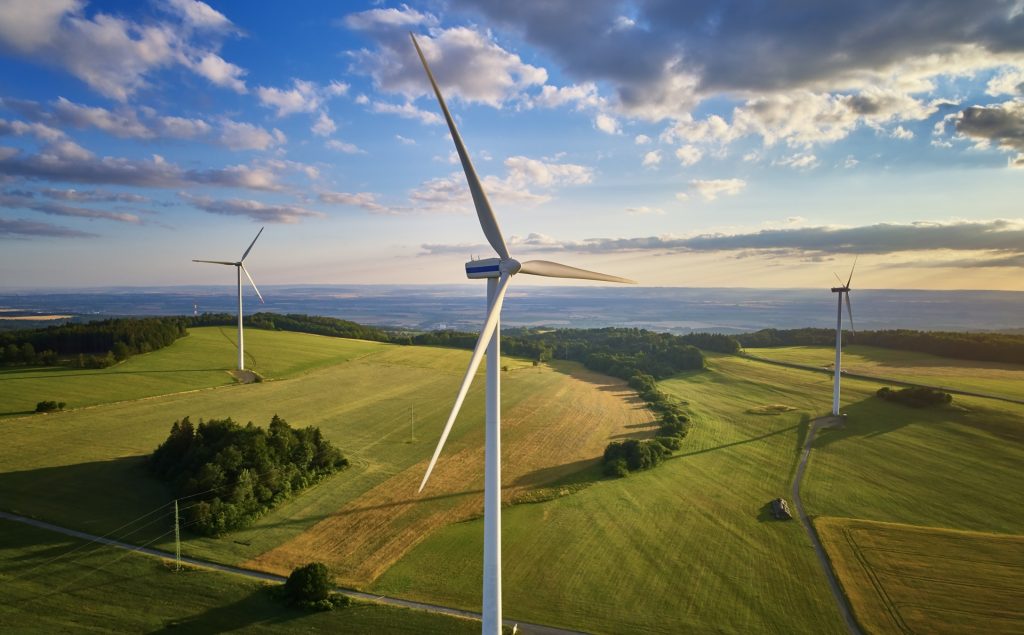 Aerial view of wind turbine farm.