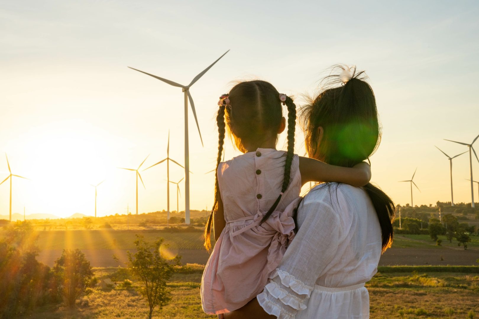 People in the community with wind generators turbines, Renewable energy.